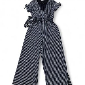 black and white striped jumpsuit with tie waist #striped #jumpsuit